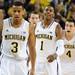 Michigan freshman Glenn Robinson III smiles after dunking the ball on Iowa in the second half at Crisler Center on Sunday, Jan. 6. Michigan beat Iowa 95-67 in the Big Ten home opener. Melanie Maxwell I AnnArbor.com